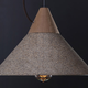Illustration for article titled A Beautiful Lampshade Carved from Solid Granite